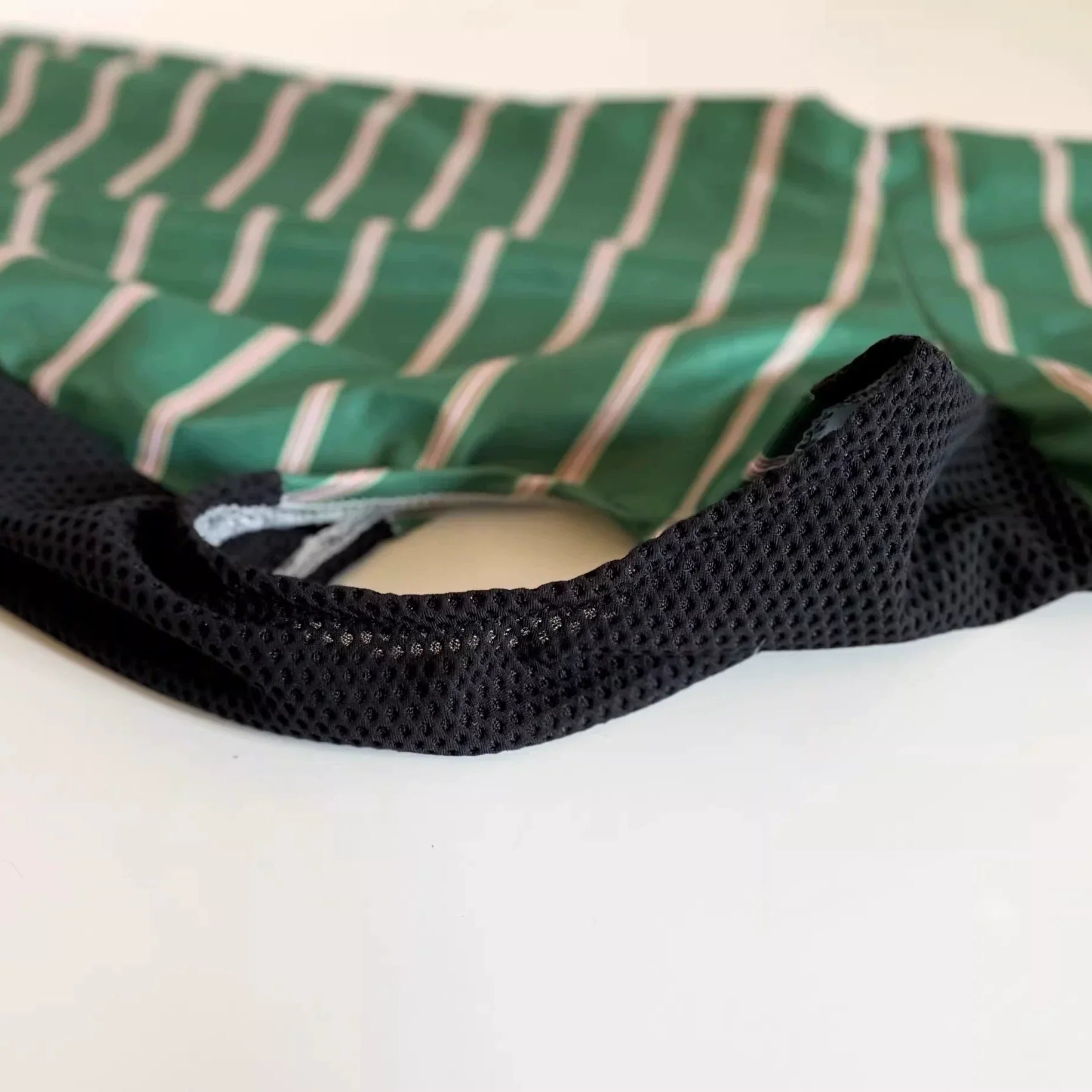 Close-up of Striped Breathable Greyhound Whippet Vest showing black mesh fabric and armhole stitching for comfort and airflow.